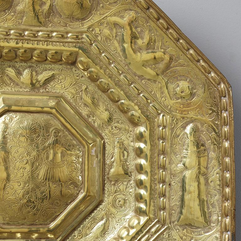 A Baroque presumably Dutch/Flemish brass reflector plate, mid 17th century.