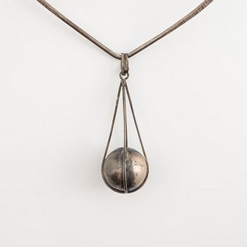 Silver necklace with pendant.