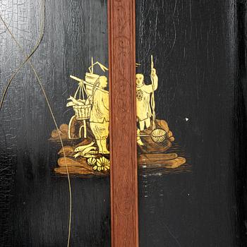 A lacquerwork wall pendulum clock, late 19th Century.