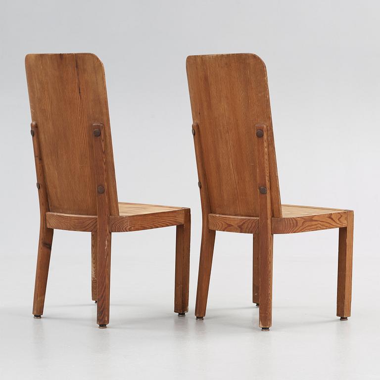 Axel Einar Hjorth, A pair of stained pine chairs, 'Lovö', Nordiska Kompaniet, Sweden 1930's.