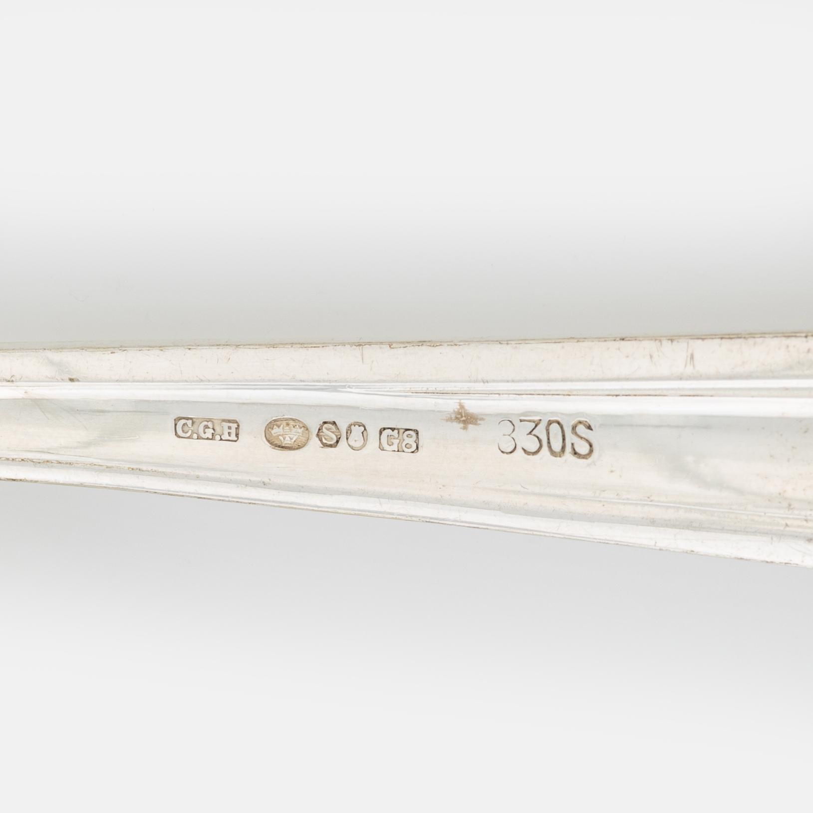 A 120- piece silver cutlery, bearing Swedish import marks, including CG. Hallberg, Stockholm, 1932.