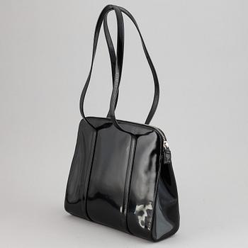 Prada, a patent leather bag.