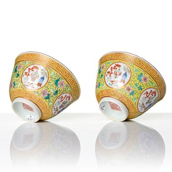 A pair of yellow ground 'medallion' bowls with covers, Qing dynasty with Daoguang mark.