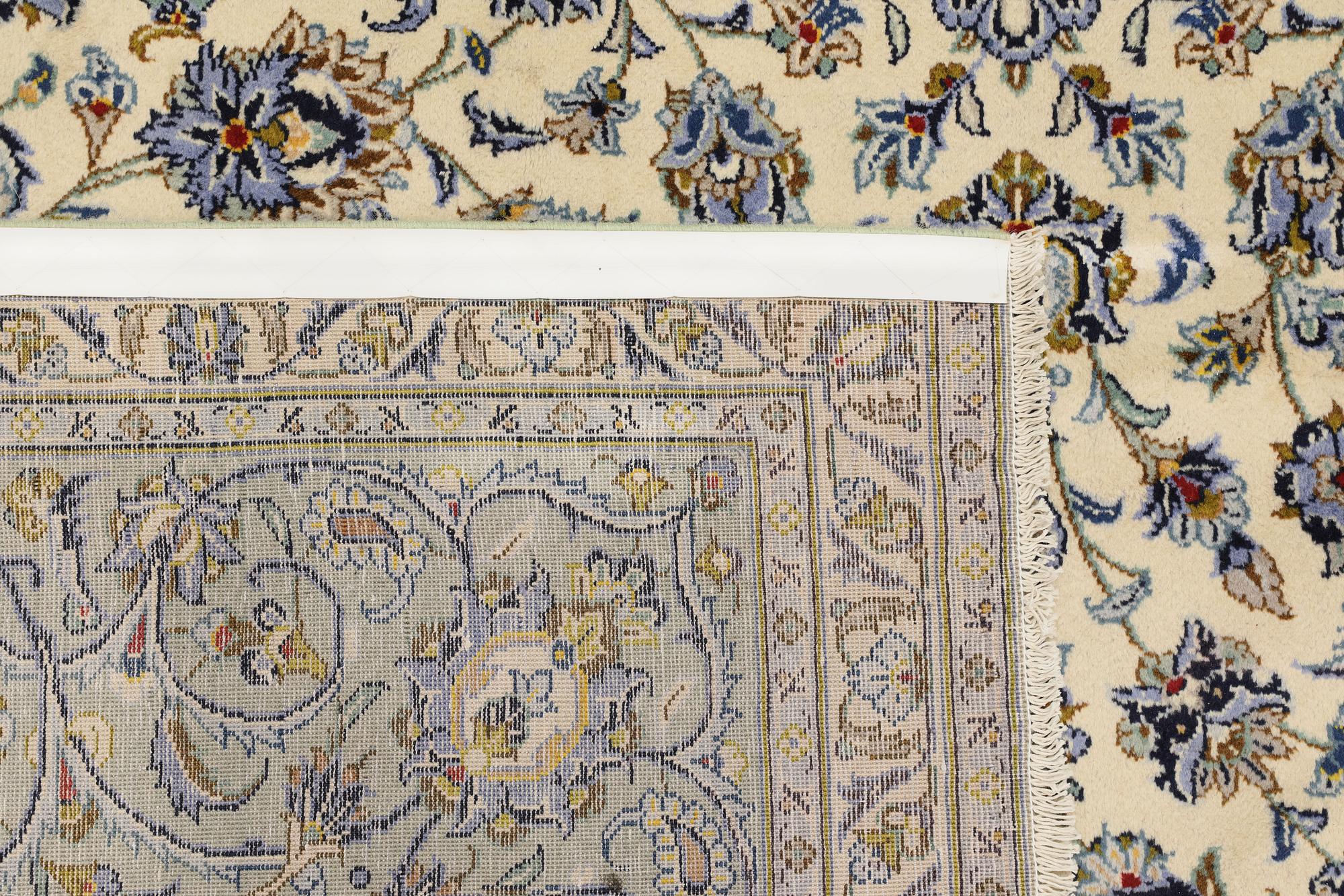 A Keshan carpet, 400 x 273 cm.