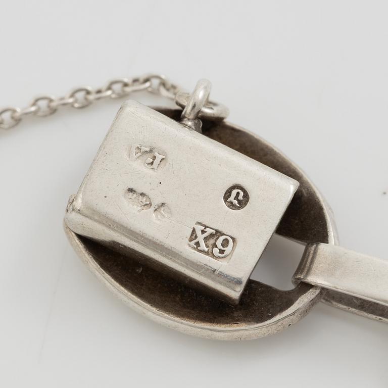 Victor Janson, two silver bracelets, one set with tiger's eye.