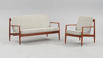 A Grete Jalk teak sofa and armchair, cusions upholstered in grey fabric, France & Daverkosen, Denmark 1960's.
