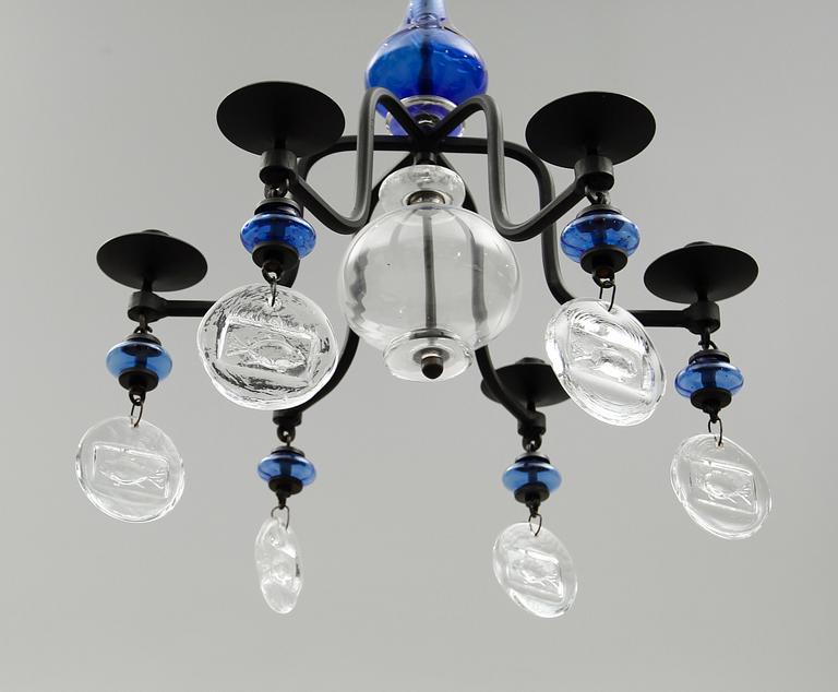 LJUSKRONA, smide och glas, Erik Höglund, 1900-talets andra hälft. Höjd ca 60 cm.