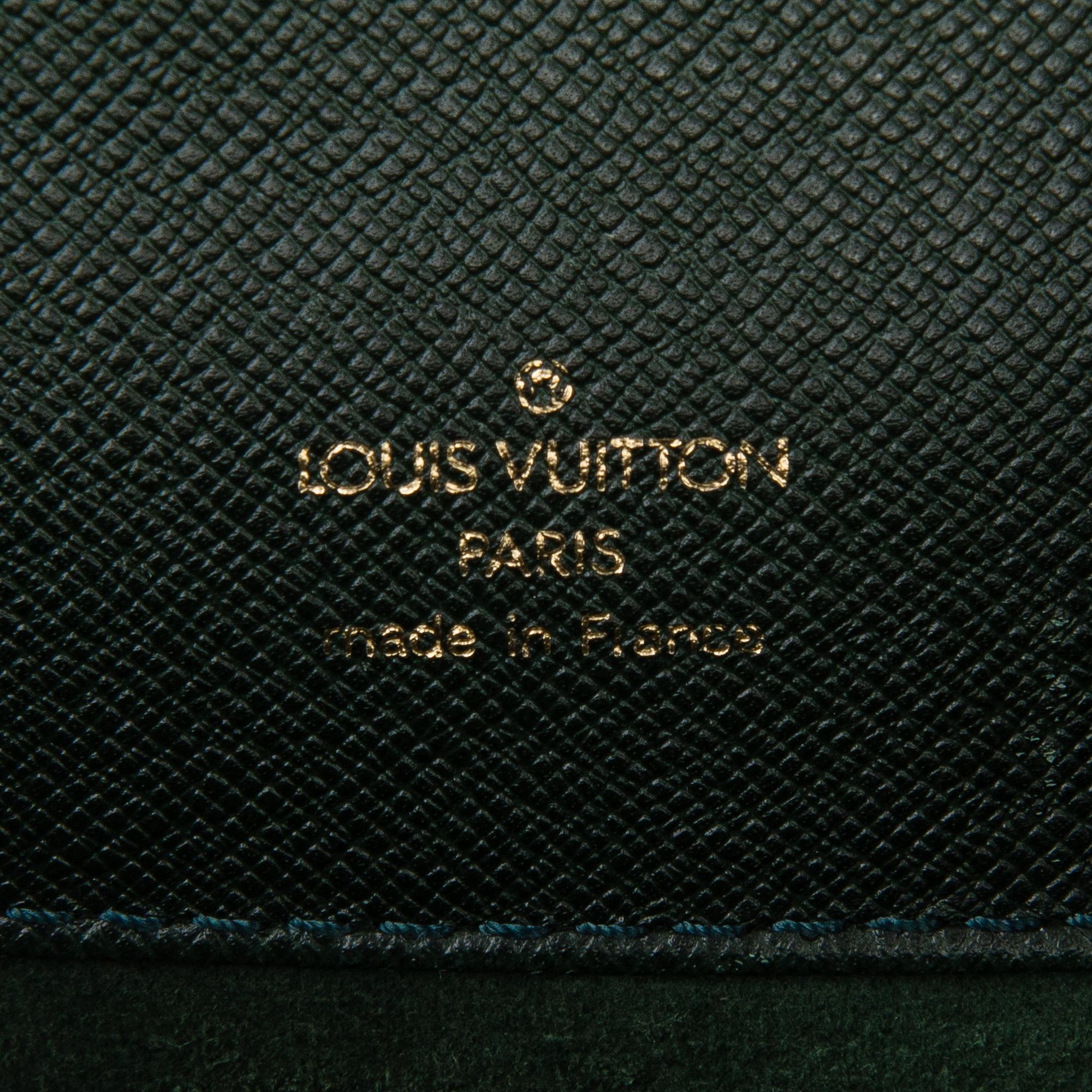 Louis Vuitton, A Taiga leather 'Minuto' Briefcase.