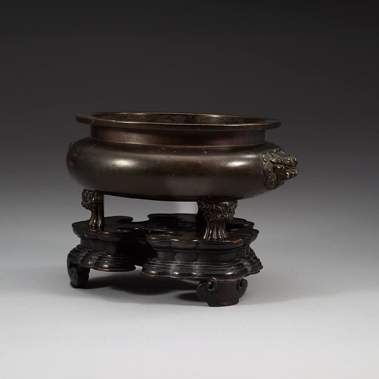 A large bronze tripod censer, Ming dynasty (1368-1644), with Xuande six character mark.