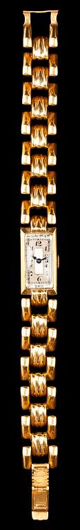 A Patek Philippe ladie's gold wrist watch.