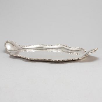 A sterling silver tray from Mexico.