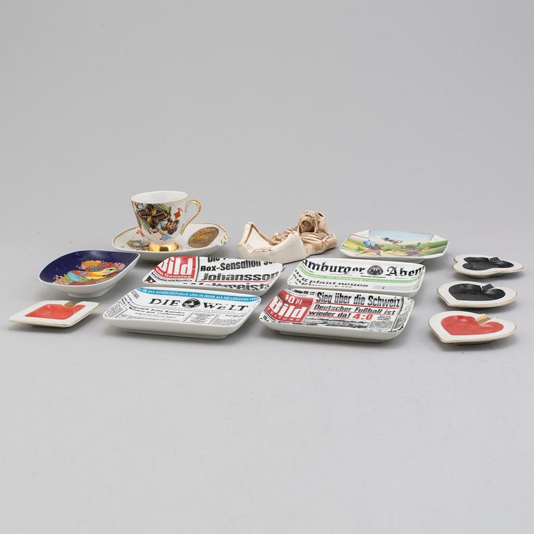 Ashtrays and cup with saucer, porcelain, 12 parts. 20th century.