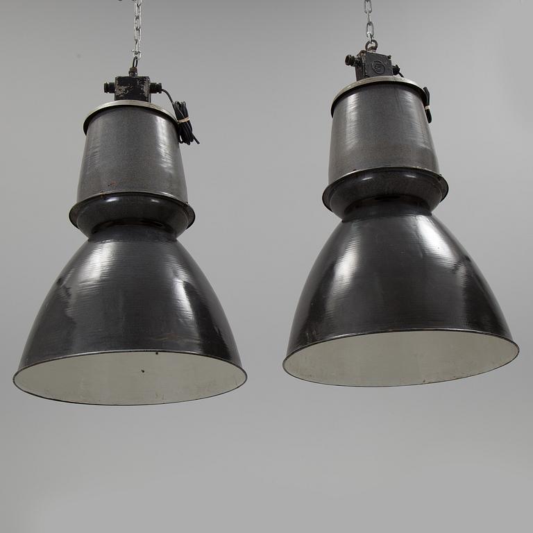 Two mid 20th century industrial lamps.