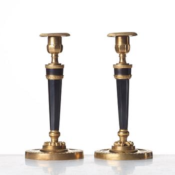 A pair of French Directoire candlesticks, circa 1800.