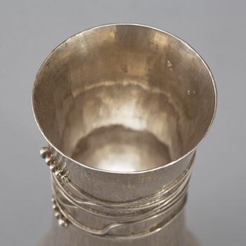 A sterling silver vase by Rosa Taikon, Stockholm, 1985, and signed Bernd Janusch.