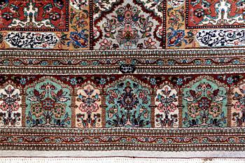 A semiantique signed Tabris carpet ca 364x262 cm.