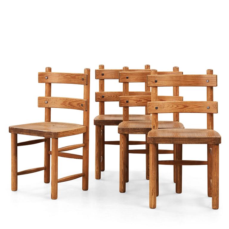 Axel Einar Hjorth, a set of four stained pine "Sandhamn" chairs, Nordiska Kompaniet, Sweden 1933.