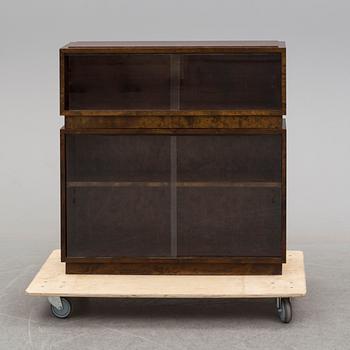 AXEL EINAR HJORTH, a stained birch 'Typenko' bookcase from Nordiska Kompaniet, 1935.