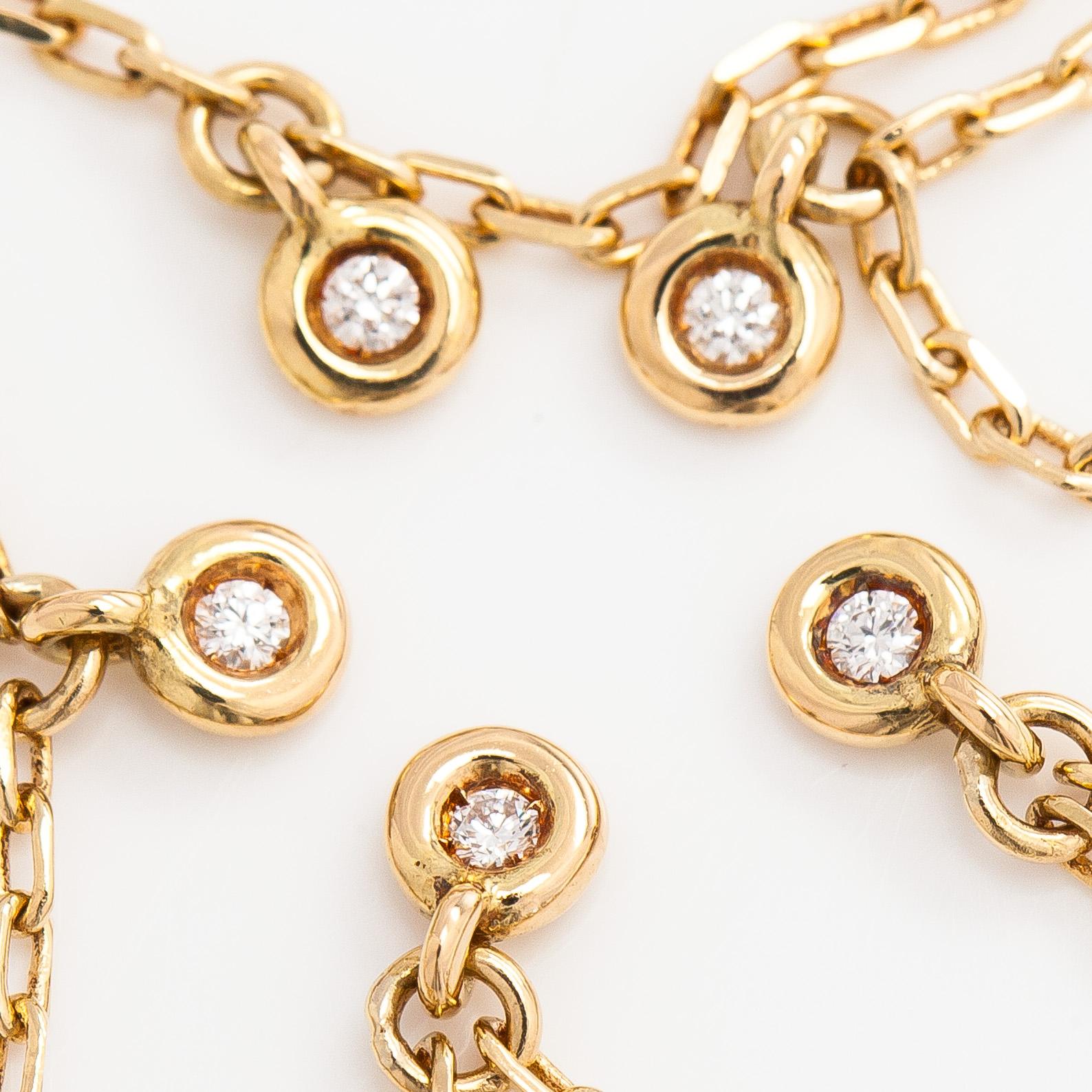 Gucci, an 18K gold 'Interlocking' bracelet with brilliant-cut diamonds.