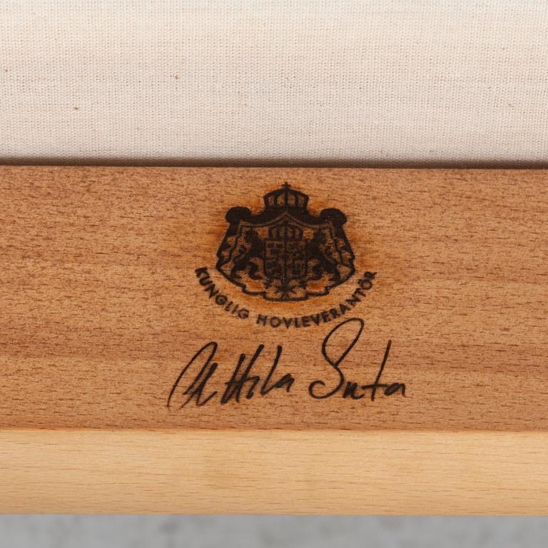 Attila Suta, eight armchairs.