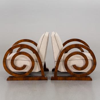 A pair of Art Deco armchairs.