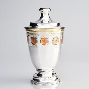 A Swedish Gustavian silver parcel-gilt beaker with cover and copper coins, mark of F Petersson Ström, Stockholm 1789.