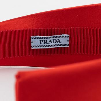 Prada, A red satin headband.