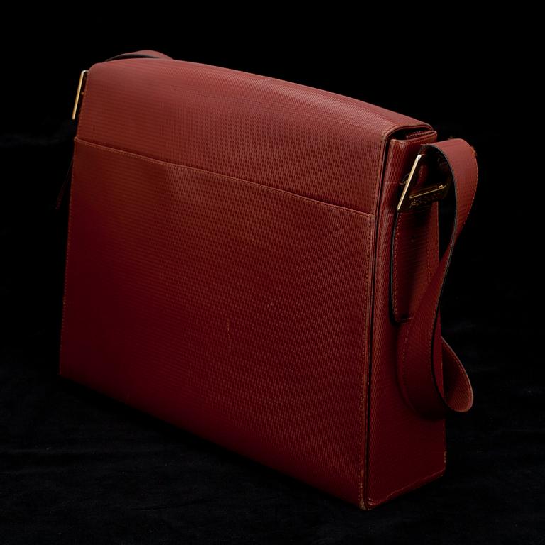 PORTFÖLJ, Yves Saint Laurent.