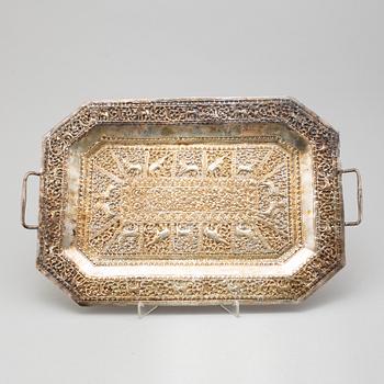 An Indian metal tray, circa 1900.
