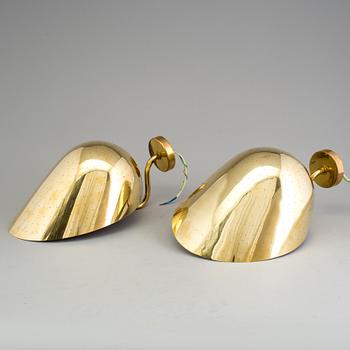 CARL-AXEL ACKING, a pair of brass wall lights.