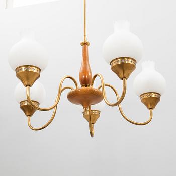 Taklampa 1900-talets mitt.