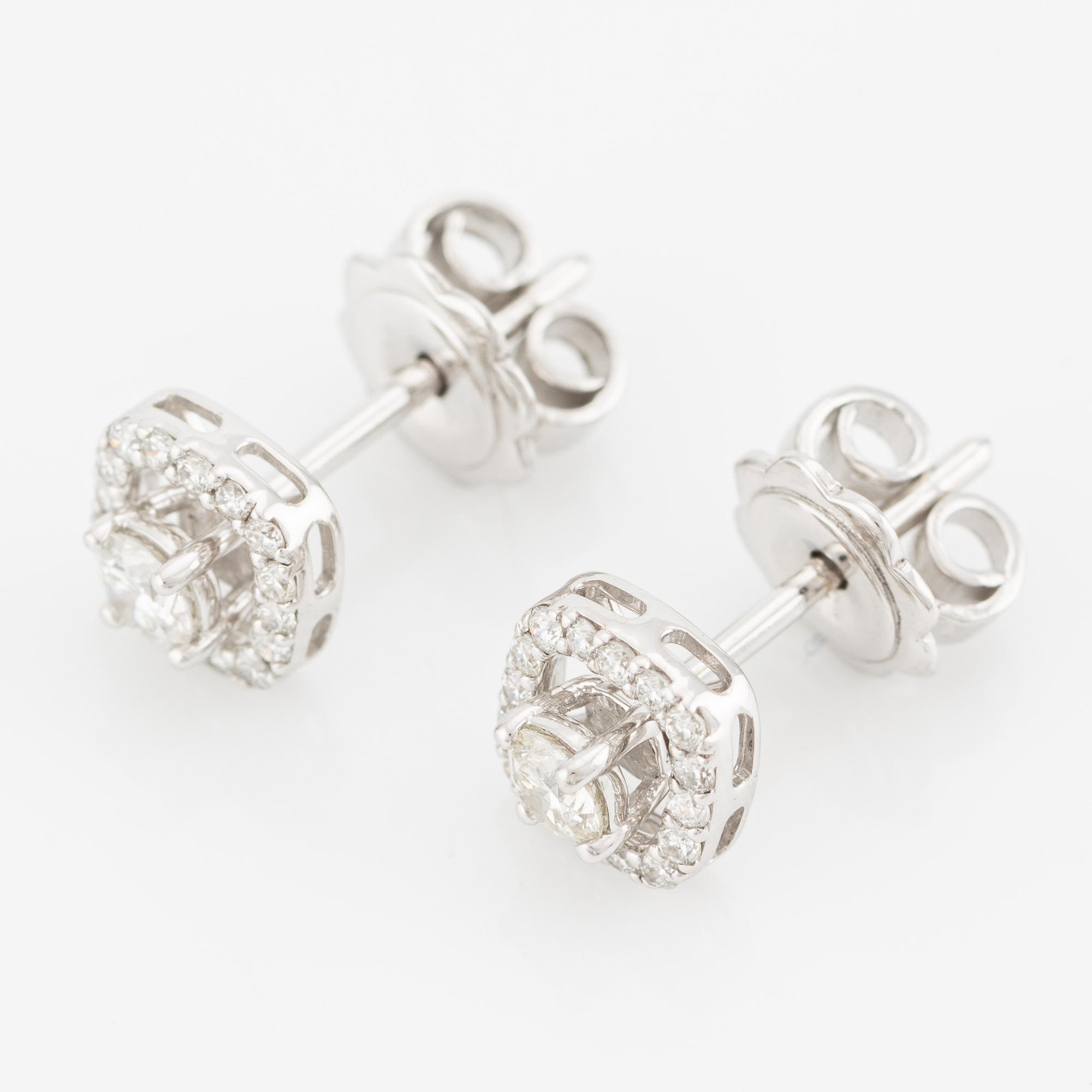 Earrings, two-part 18K white gold with brilliant-cut diamonds.