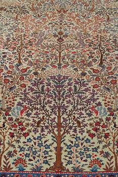A CARPET, a semi-antique Tabriz probably, ca 393 x 284 cm.