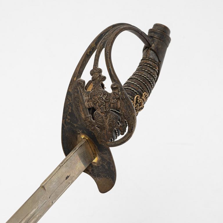 A 1889 pattern Prussian infantery officer's sabre with scabbard.