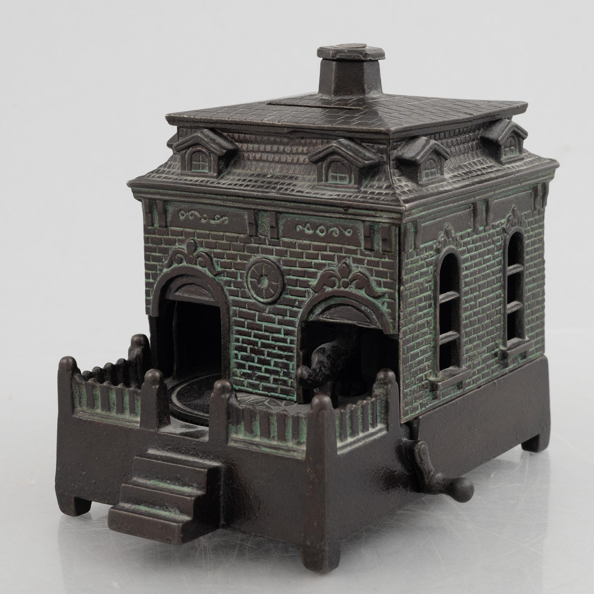 A mechanical bank, late 19th century, probably by Judd Manuf. Comp.
