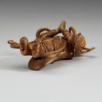 A gilt bronze figure of a Lokapala, Qing dynasty, 19th Century.