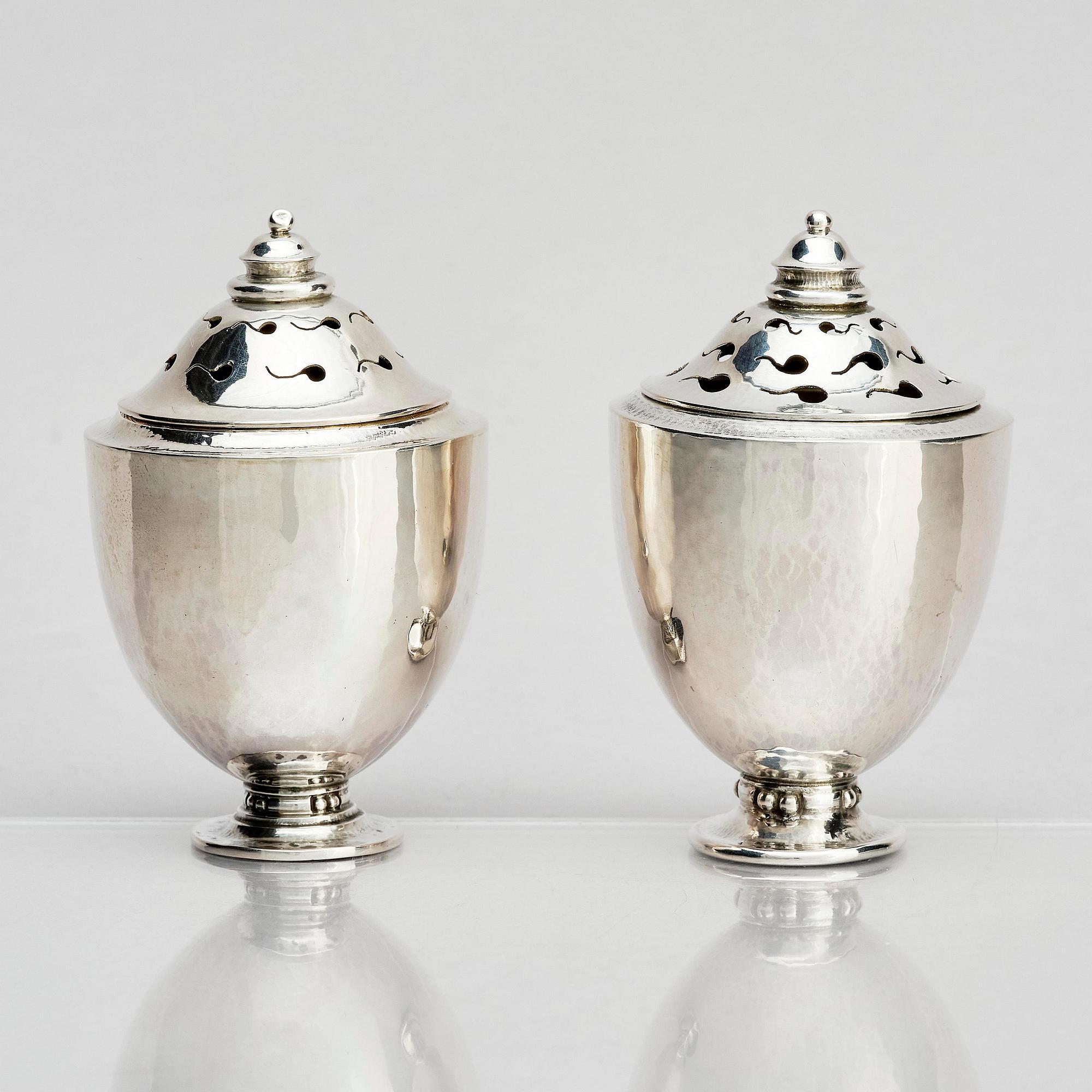 Georg Jensen, a pair of silver casters, design Johan Rohde, Copenhagen 1915-1921.