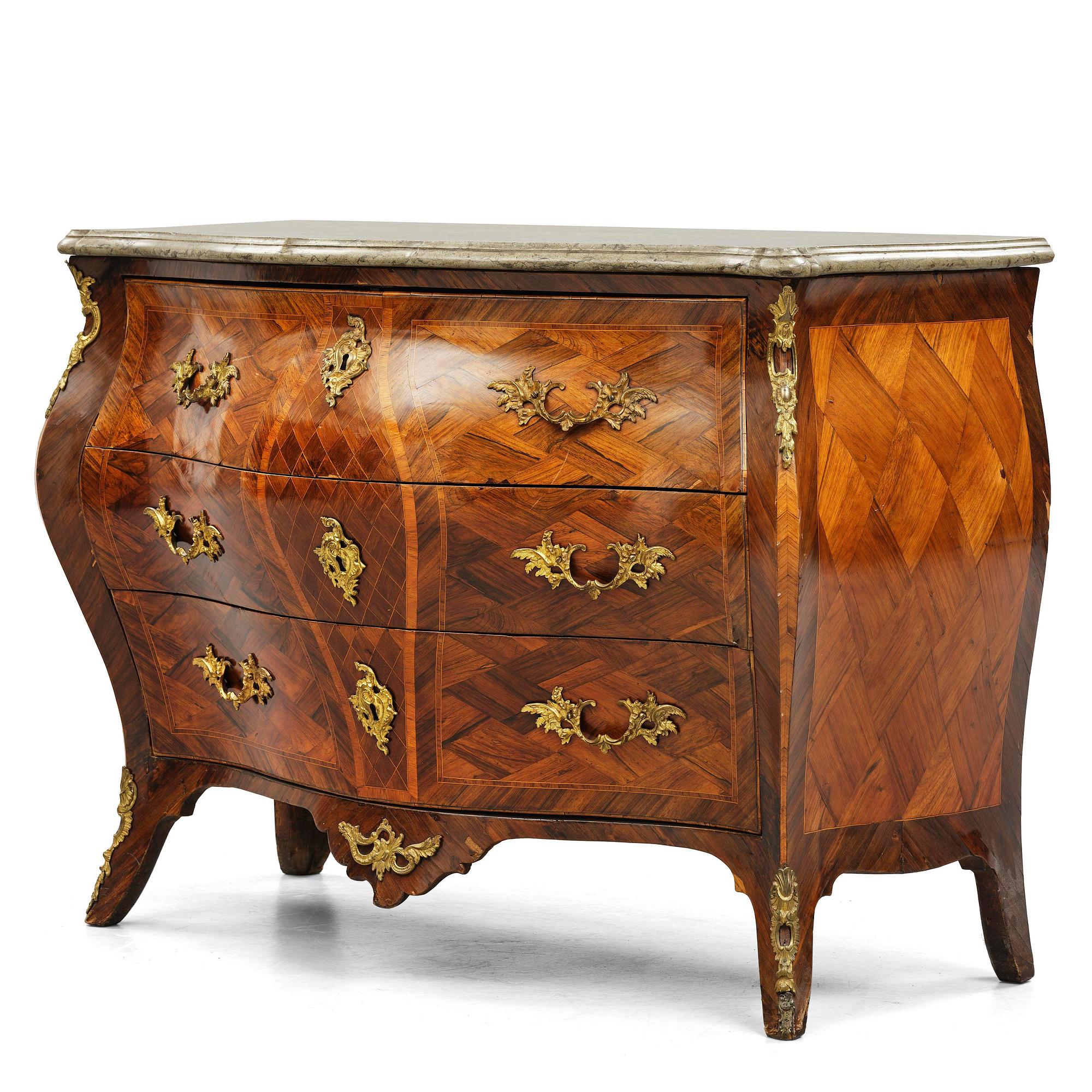 A Swedish rococo parquetry commode attributed to J. Noraeus (master in Stockholm 1769-81).