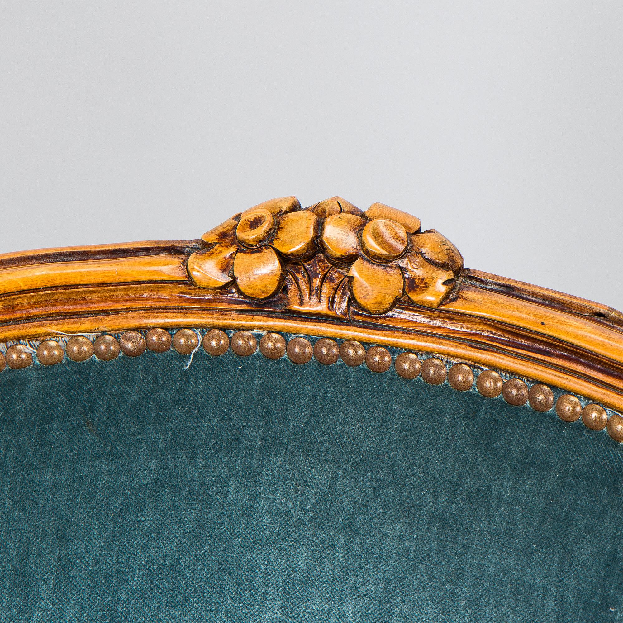 A pair of Louis XV style armchairs, mid-20th century.