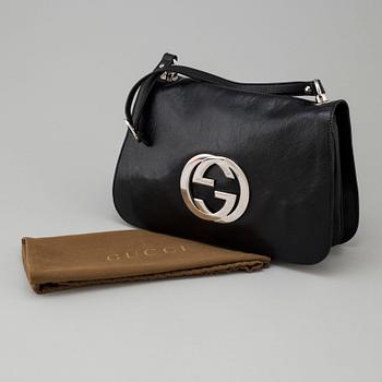 A bag by Gucci.