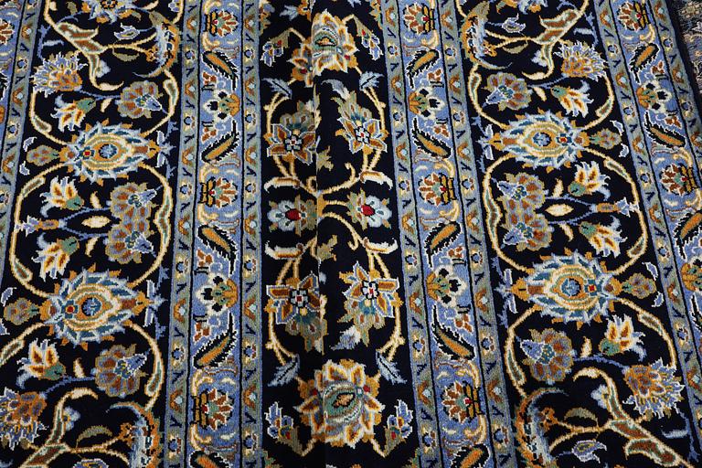 A carpet, Kashan, c. 393 x 297 cm.