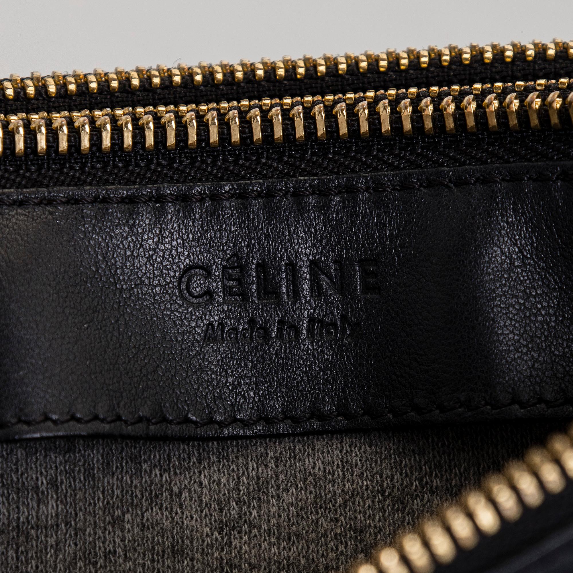 Céline, a black leather 'Trio Small' bag.