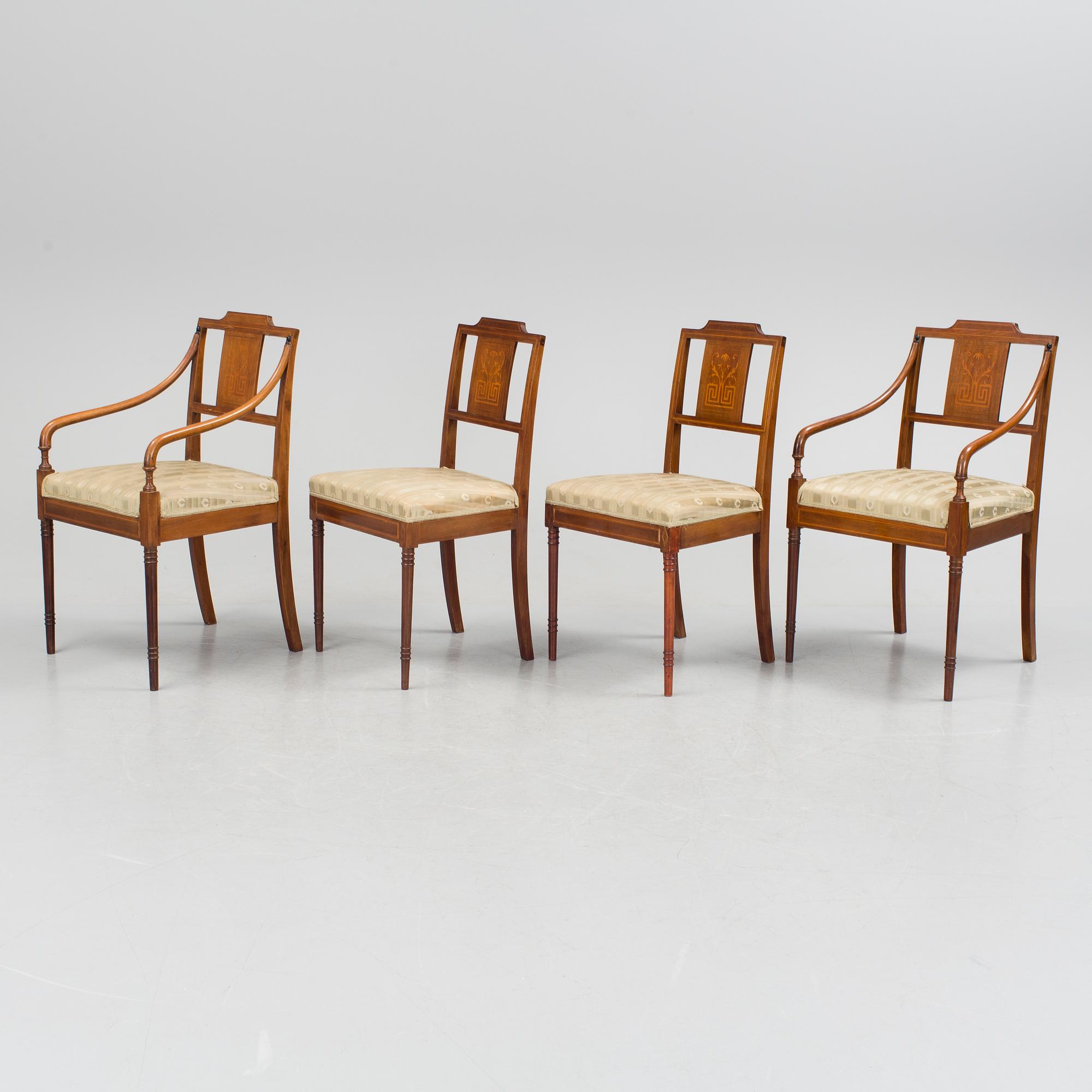 A 1920/30s Swedish Grace sofa, a pair of chairs, a pair of armchairs and a table veneered with mahogany.