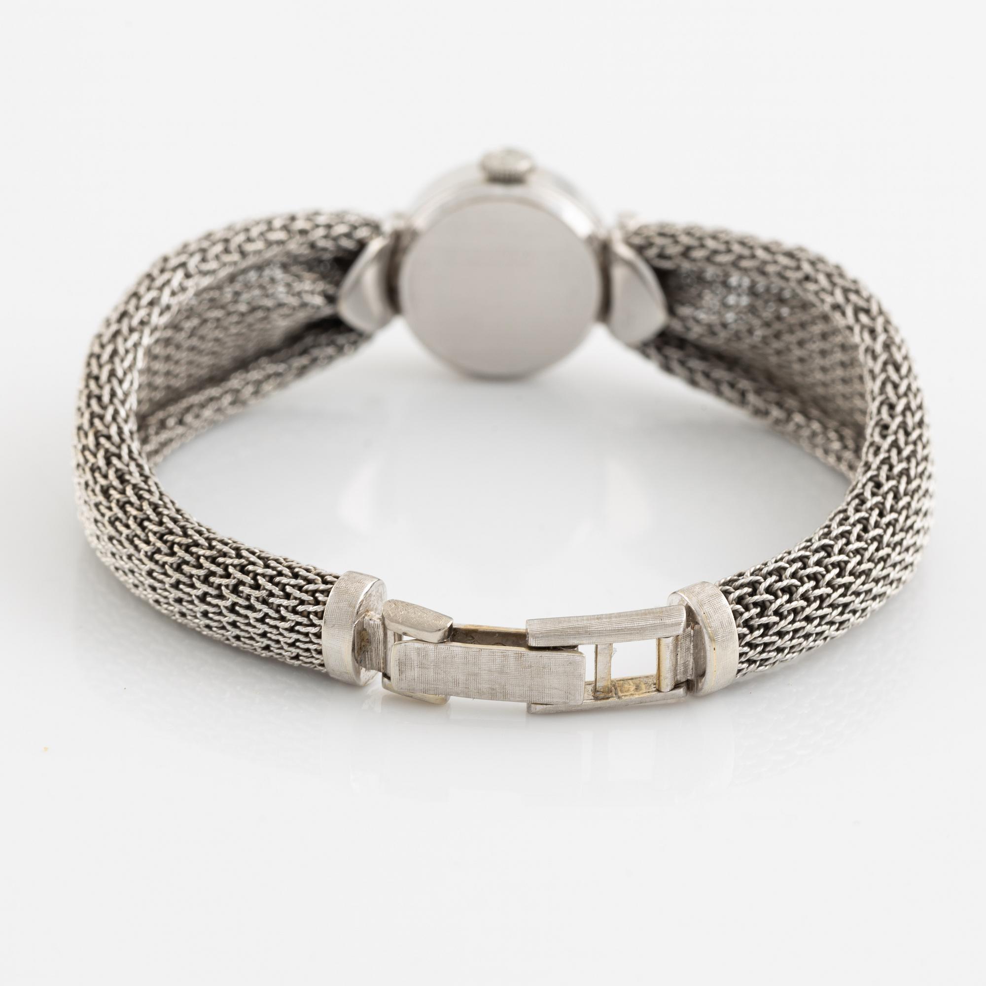 White gold and brilliant cut diamond cocktail watch.