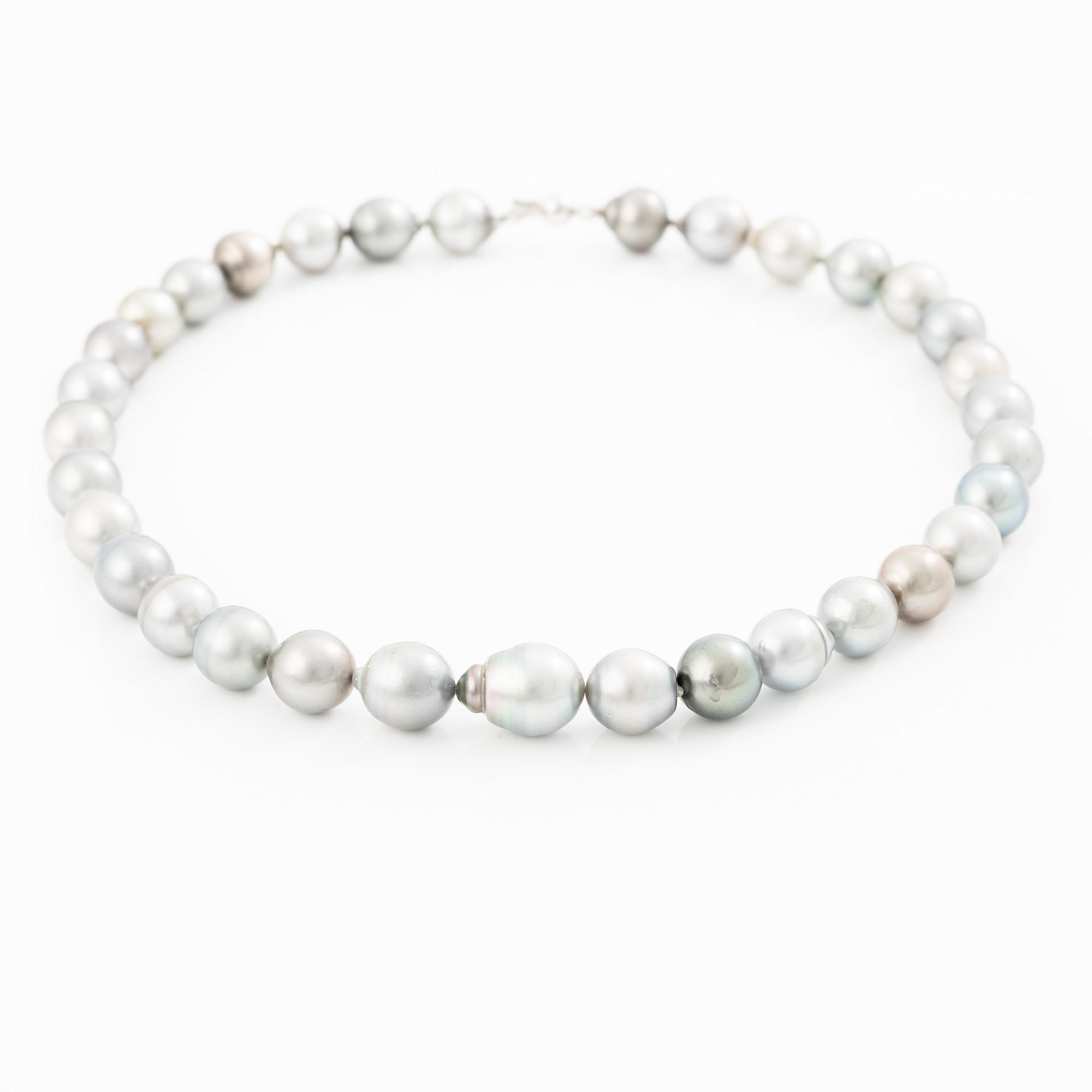 Necklace with cultured baroque Tahitian pearls.