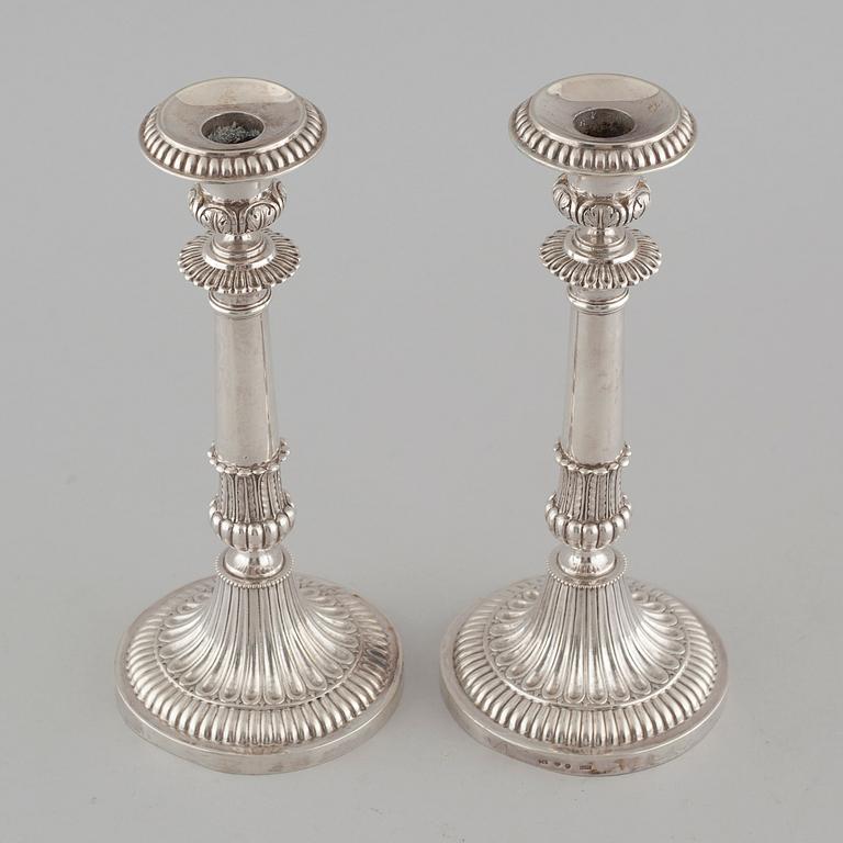 a pair of silver candlesticks, 1830.