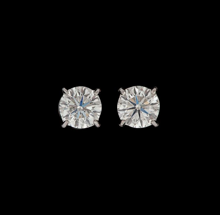 A pair of diamond, 1.01 cts and 1.01 cts. H/VS1, earrings.