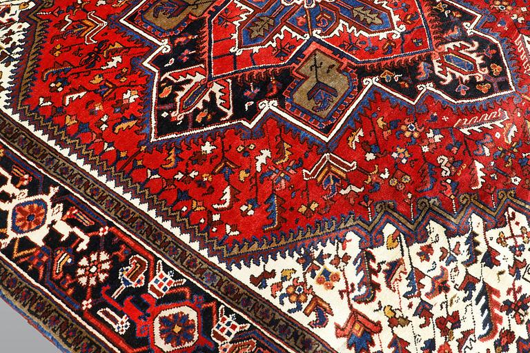 A carpet, Heriz, c. 307 x 246 cm.