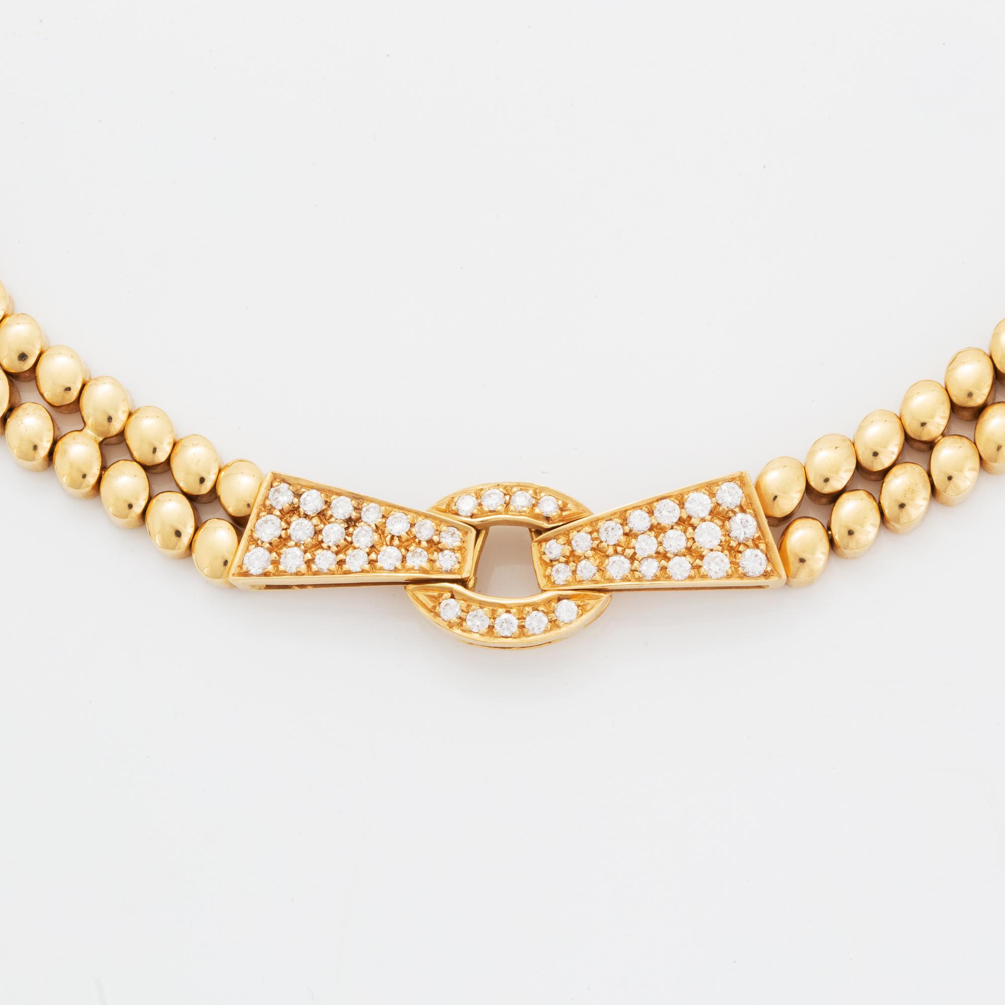 An 18K gold necklace and bracelet.