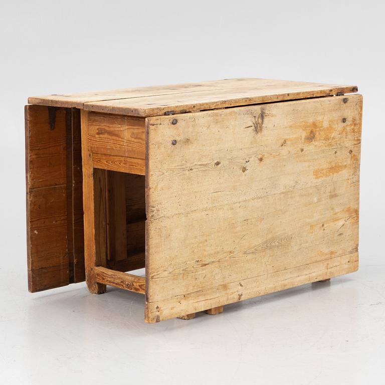 A 19th century gate-leg table.